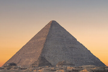 Fototapeta na wymiar A view of the huge pyramid of Cheops, Giza, Egypt at sunrise. 