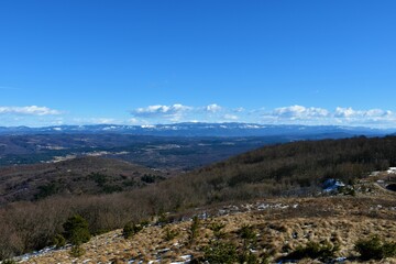 View of Sneznik mountain in Slovenia viewed from Slavnik in winter