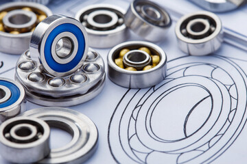 bearings of different types, micrometer, caliper and ruler on the drawings of technical products. Technologies and engineering.
