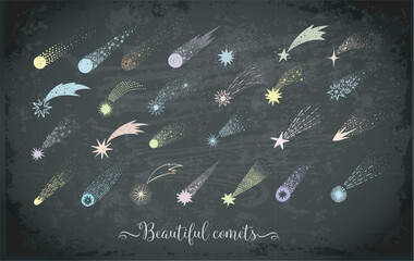 Collection of doodle comets, meteorites and shooting stars on blackboard background. Vector sketch illustration. © elinacious