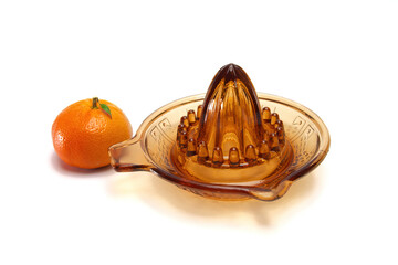 simple glass citrus juicer, tangerine isolated on white