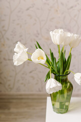 White tulips in vase. Natural. Spring bouquet at home