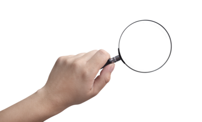 hand holding a magnifying glass on a transparent background PNG