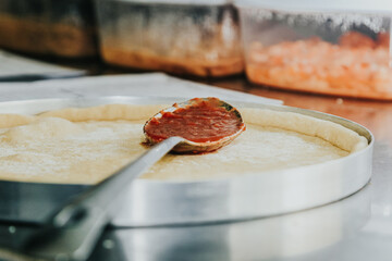 Fazendo pizza