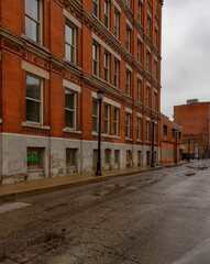 Fototapeta na wymiar Dreary wet day in older section of downtown District in Cleveland, Ohio., USA