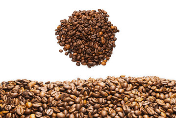 Coffee beans on a white background. Top view.