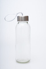 glass water bottle on a white background