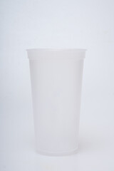 Reusable plastic water cup on a white background