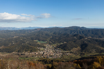 Fototapeta na wymiar Sant Feliu de Pallerols city from the top view in the winter, city in the mountains, Catalonian nature, Spain