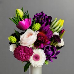 bouquet of tulips in vase, different colors of flowers, on a background