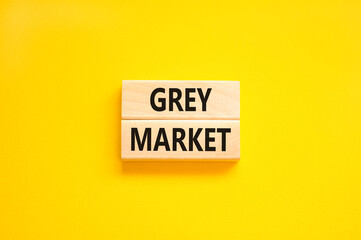 Grey market symbol. Concept words Grey market on wooden block. Beautiful yellow table yellow background. Business grey market concept. Copy space.