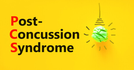 PCS post-concussion syndrome symbol. Concept words PCS post-concussion syndrome on yellow paper on a beautiful yellow background. Medical and PCS post-concussion syndrome concept. Copy space.