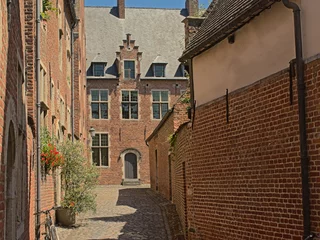 Deurstickers Medieval houses in Groot Begijnhof beguinage, UNESCO world heritage site in  Leuven, Flanders, Belgium © Kristof Lauwers