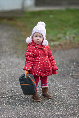 A little girl and the harsh northern late autumn