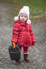 A little girl and the harsh northern late autumn