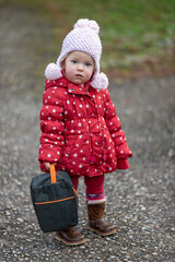 A little girl and the harsh northern late autumn