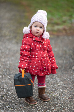 A little girl and the harsh northern late autumn
