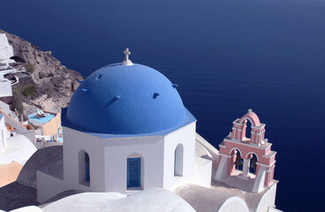 Beautiful blue domed church in Oia,  island of Santorini, Greece