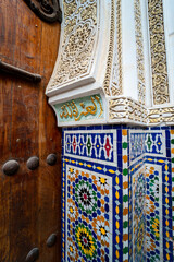 Old Moroccan wooden door in the medina of Fez, Morocco