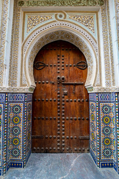 Old Moroccan wooden door in the medina of Fez, Morocco