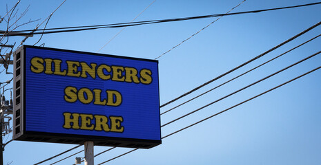 "Silencers Sold Here" Sign