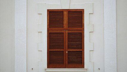 Obraz na płótnie Canvas window with wooden shutters