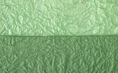 texture of crumpled colored light green gift paper for banner background