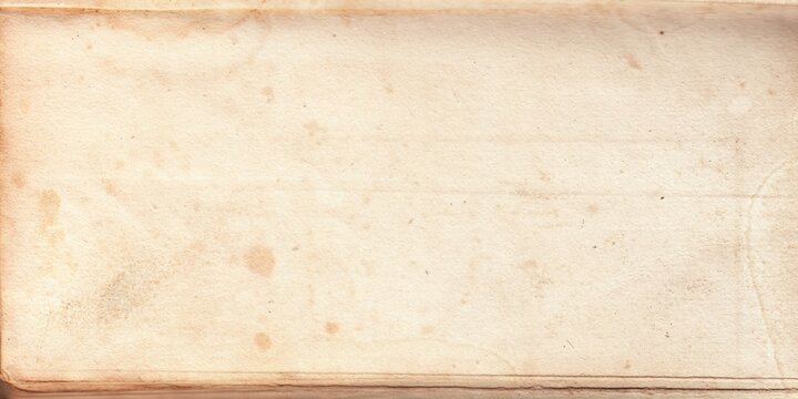 Old brown paper parchment background design with distressed vintage stains and ink spatter and white faded shabby center, elegant antique beige color