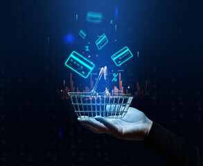 A woman's hand holds a metallic shopping cart and payment card icons, the concept of starting a...