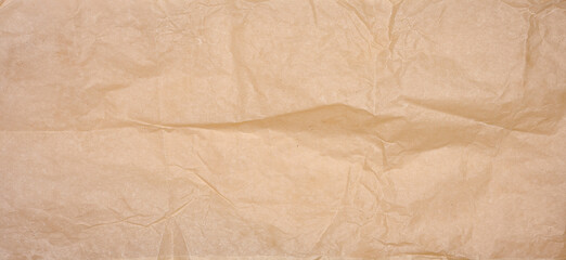 Crumpled brown parchment paper, close up