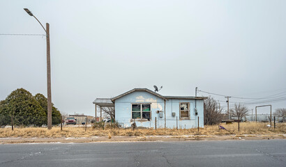 Fototapeta na wymiar Depressed housing in the city of Hobbs, New Mexico, USA