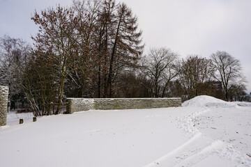 Winter landscape with a lot of white snow during day time. Trees on the back. Talliin, Estonia. February 2023