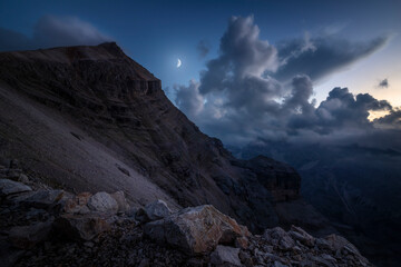 Clouds after sunset in the Tofane range, famous mountains in Cortina d'Ampezzo, Italy
