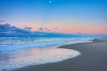 Beautiful Baltic sea beach on the Hel Peninsula at sunset. Poland