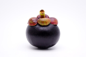 Mangosteen isolated on white background. Mangosteens, the famous delicious fruit from Thailand, In Asia it also known as The Queen of Fruits