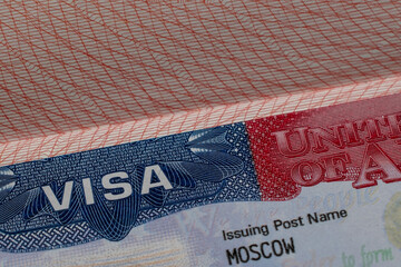 US visa stamp in a travel passport, United States of America immigrant, work and travel documents, emigration, immigration, tourism concept