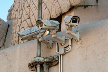 Surveillance cameras on the wall, multiple security cameras