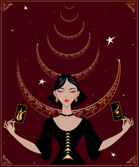 A beautiful elegant lady in luxurious velvet holds tarot cards. Tarot divination.