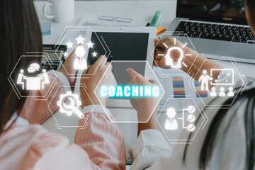 Coaching concept, Business person team working on laptop computer with coaching icon on virtual...