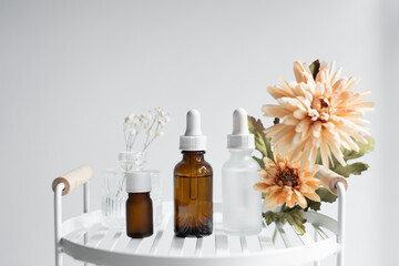 The natural skincare bottle with flowers.