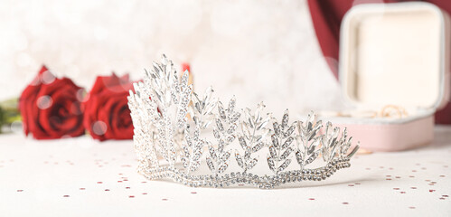 Beautiful tiara on light background. Prom concept © Pixel-Shot