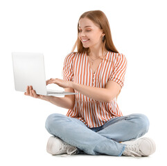 Naklejka premium Beautiful girl using laptop on white background