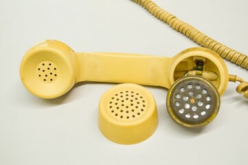 old vintage telephone on white background
