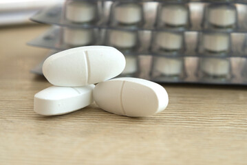 Close up of calcium tablets.