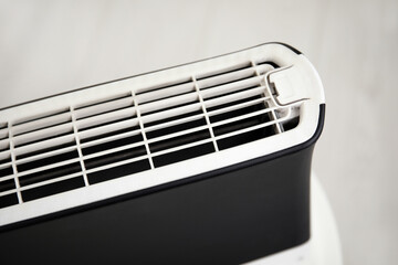 Air purifier on table in room, closeup