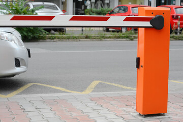 Automatic closed boom barrier on city street © New Africa