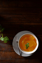 sweet yellow kolang kaling jelly in a ceramic bowl