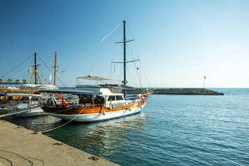  Mediterranean resort in Side in a beautiful summer day, Turkey. Yachts in harbour of resort city Side. Turkey.