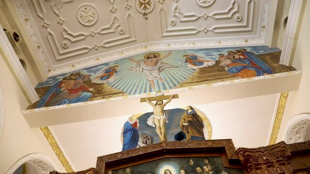interior architectural paintings and artistic ceilings in the ceiling of the church
- low angle