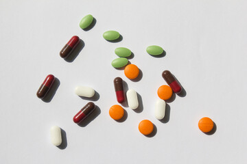 colorful pills on a white background